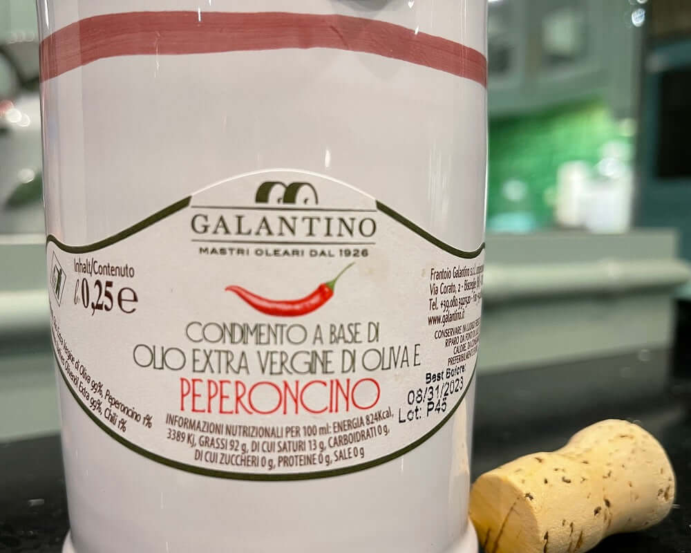 Galantino Peperoncino Extra Virgin Olive Oil in a Hand-Painted Ceramic Cruet Jug